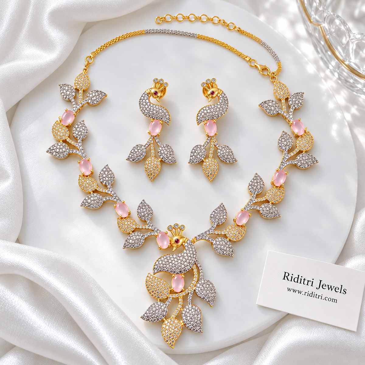 Mayuri two-tone AD peacock necklace set with baby pink stones and matching earrings