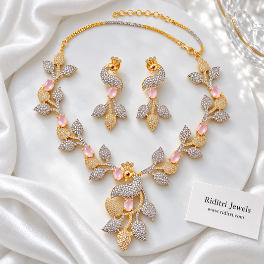 Mayuri two-tone AD peacock necklace set with baby pink stones and matching earrings