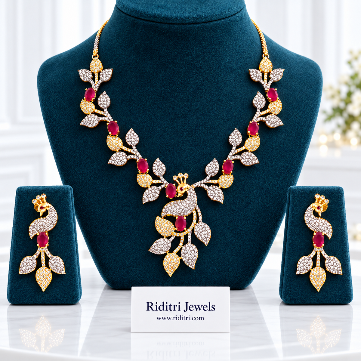 Mayuri two-tone AD peacock necklace set with ruby red stones and matching earrings