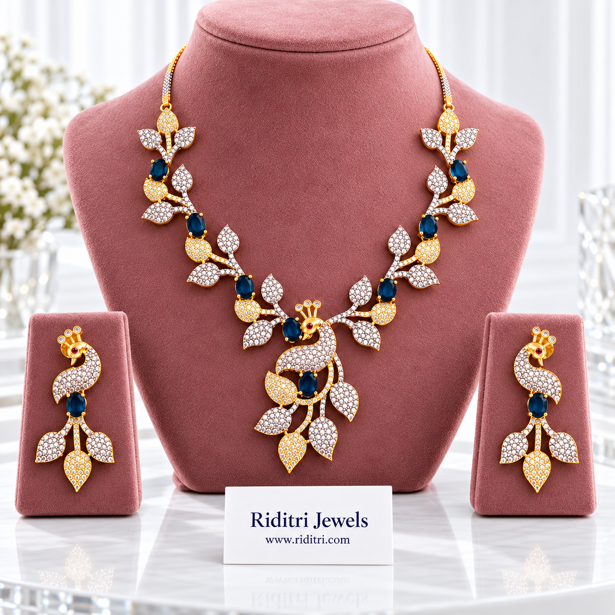 Mayuri two-tone AD peacock necklace set with royal blue stones and matching earrings