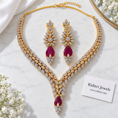Silver and gold two-tone marquise leaf V-shaped necklace with ruby teardrop drop