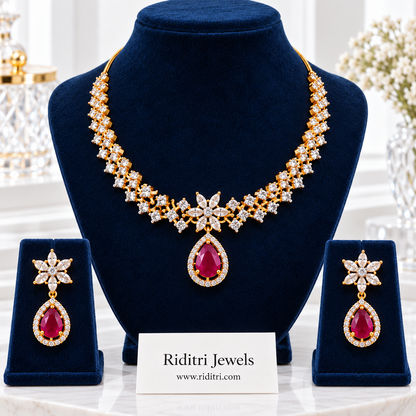 Sitara gold-toned AD stone necklace set with ruby red teardrop pendant and earrings