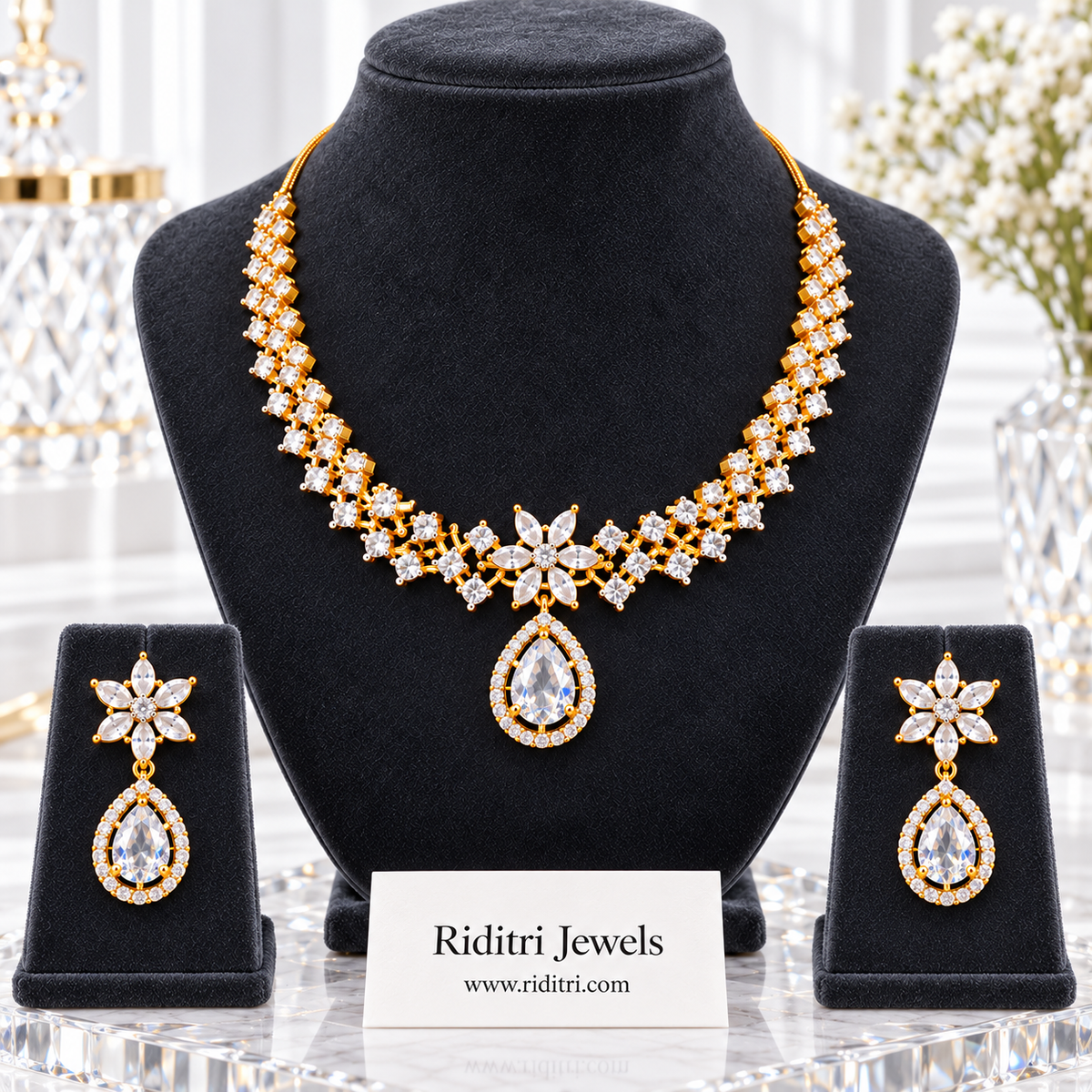 Zig-zag AD stone necklace with star flower centre and white teardrop for weddings