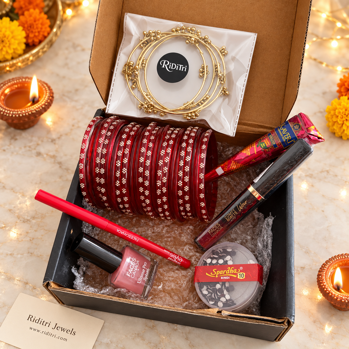 Red glass bangles gift hamper with beauty essentials for Diwali and wedding gifting