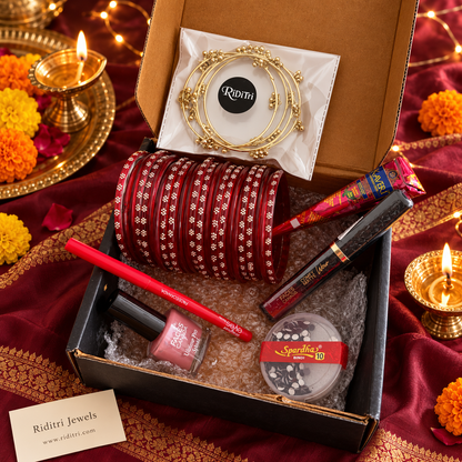 Open Riditri gift box with red flower dot glass bangles and Kashmiri ghungroo bangles