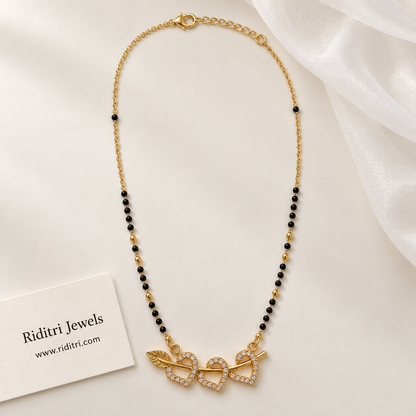 Daily wear round black bead mangalsutra chain with gold beads and heart pendant