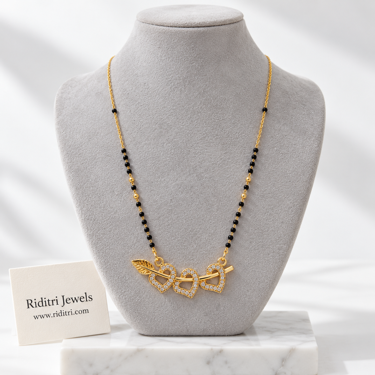 Ishq anti-tarnish triple heart mangalsutra with black beads and AD stone hearts