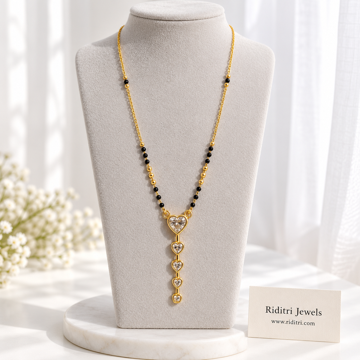 Dil anti-tarnish heart drop mangalsutra with black beads and heart-cut AD stone