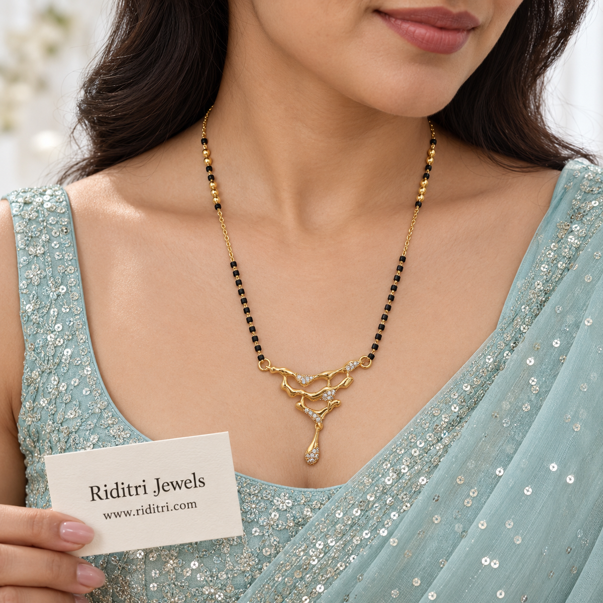 Lehar anti-tarnish liquid gold mangalsutra with molten gold wave pendant and black beads