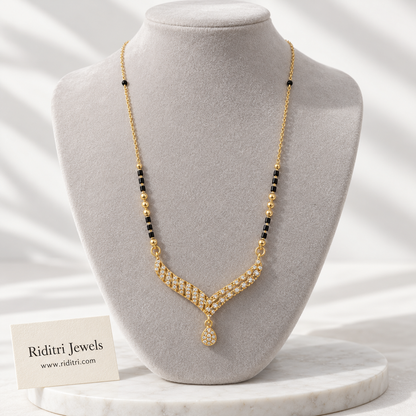 Gold-toned V-shaped mangalsutra pendant with sparkling stones and pave teardrop