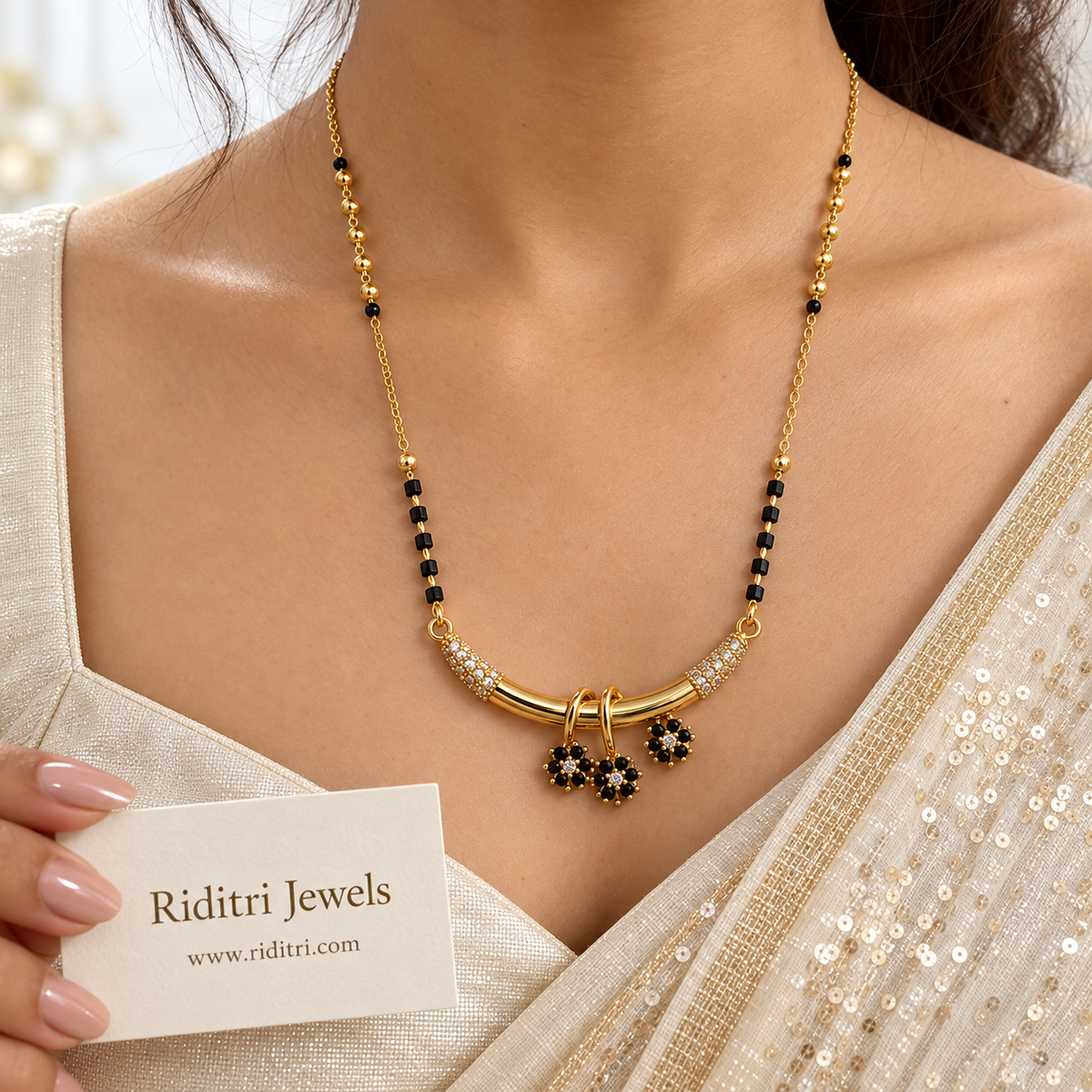 Kali anti-tarnish mangalsutra with curved gold bar and three black stone flower charms