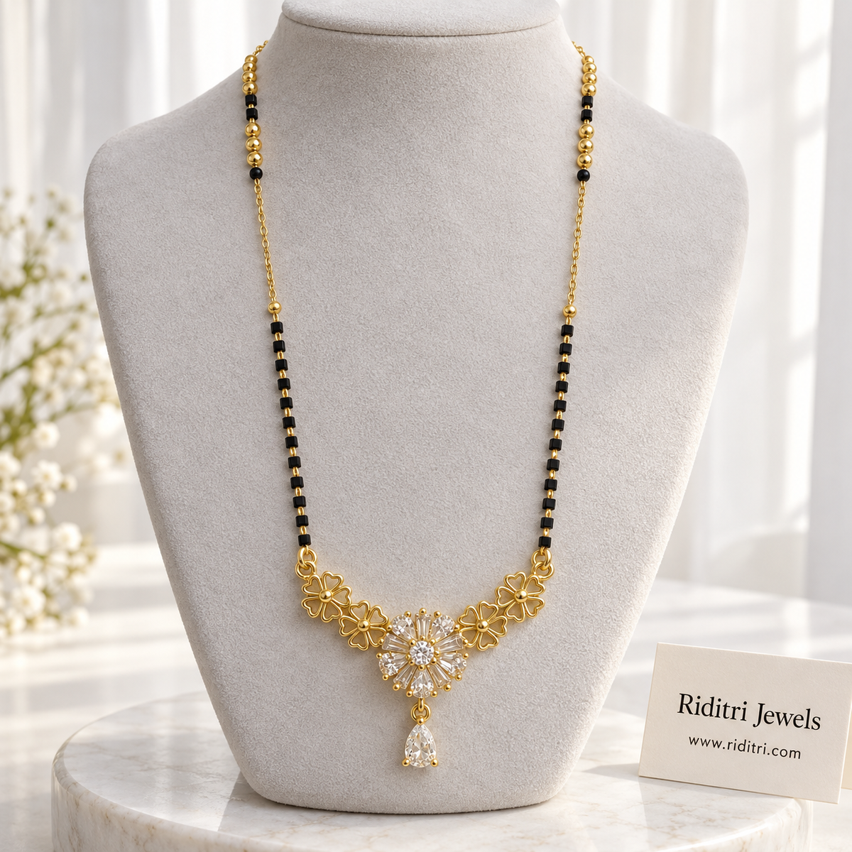 Gulmohar anti-tarnish floral mangalsutra with gold flowers, AD stone flower centre and teardrop