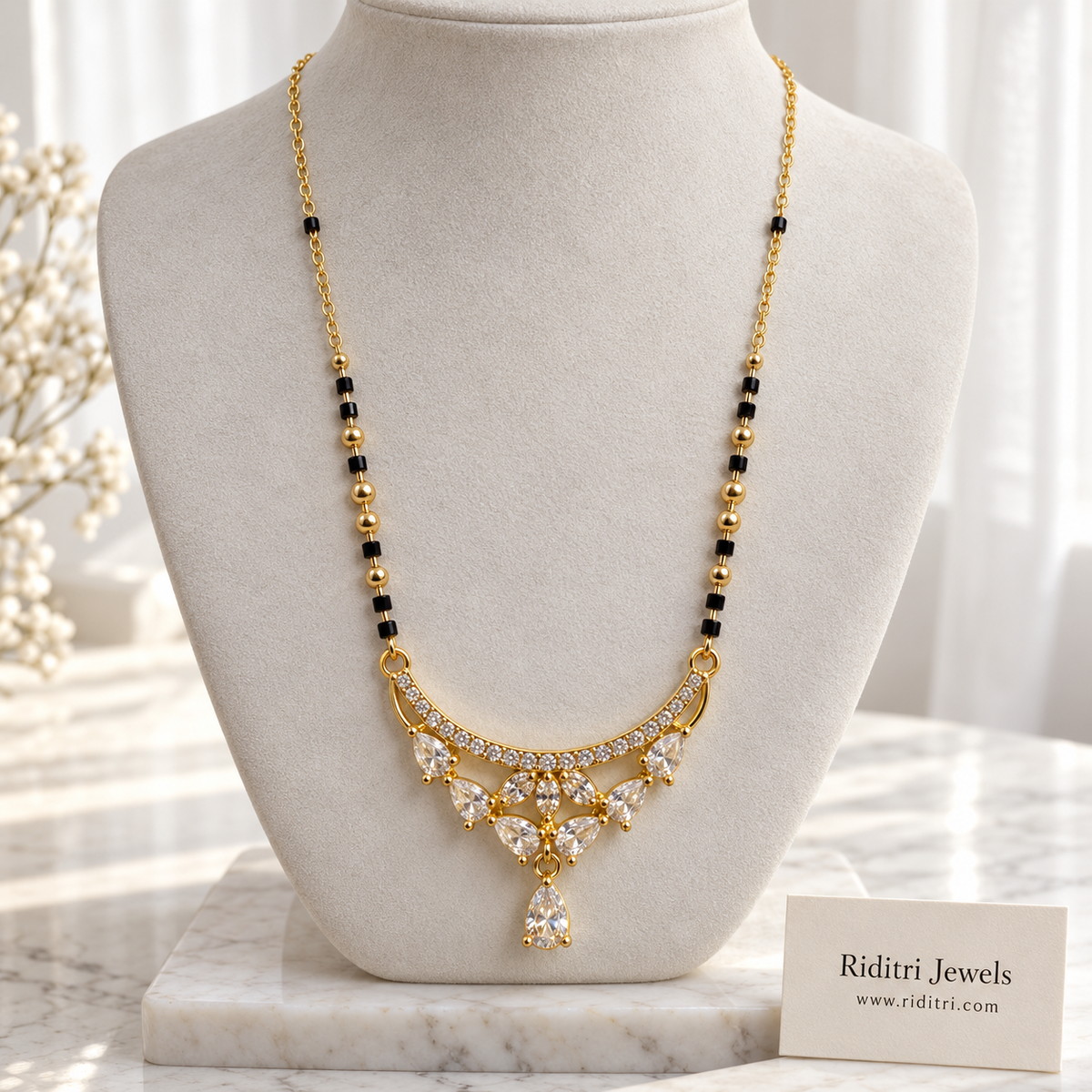 Rajni anti-tarnish crescent mangalsutra with AD stone crescent and teardrop drop