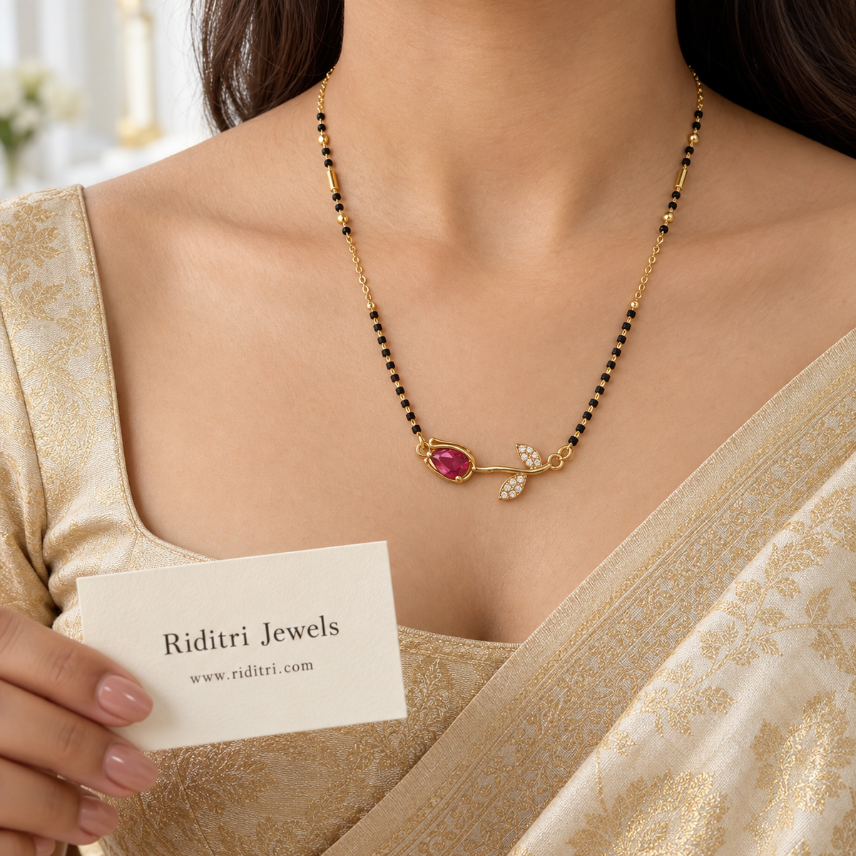 Gold-toned rose mangalsutra pendant with ruby pink stone and AD stone leaves