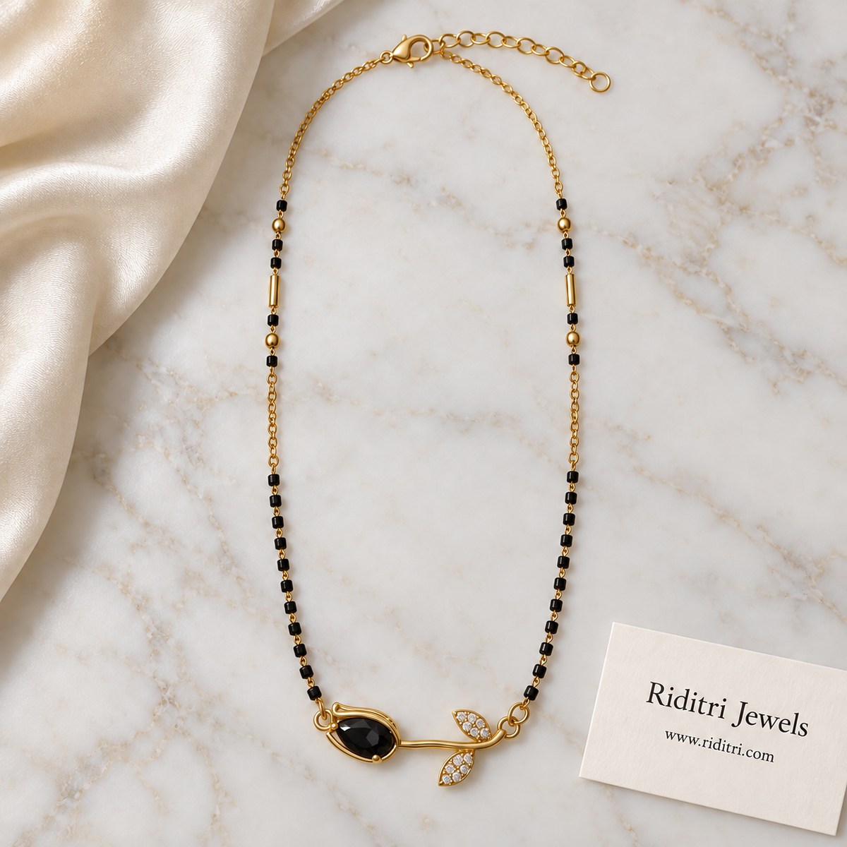 Black bead mangalsutra chain with gold beads and black rose pendant