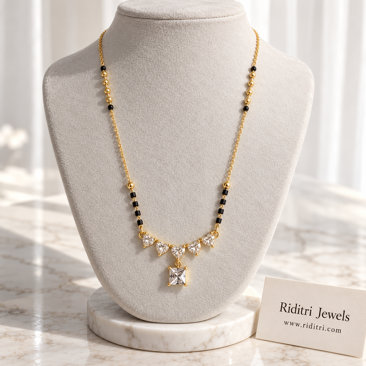 Heera anti-tarnish mangalsutra with row of five heart AD stones and square solitaire drop