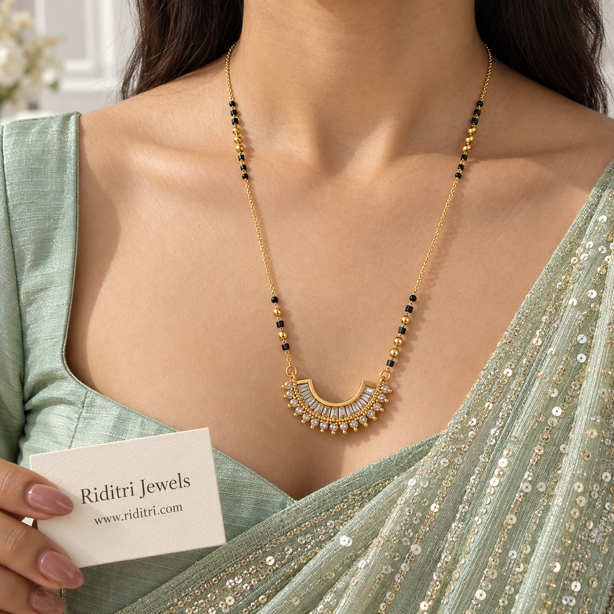 Usha anti-tarnish half moon mangalsutra with baguette and round AD stones