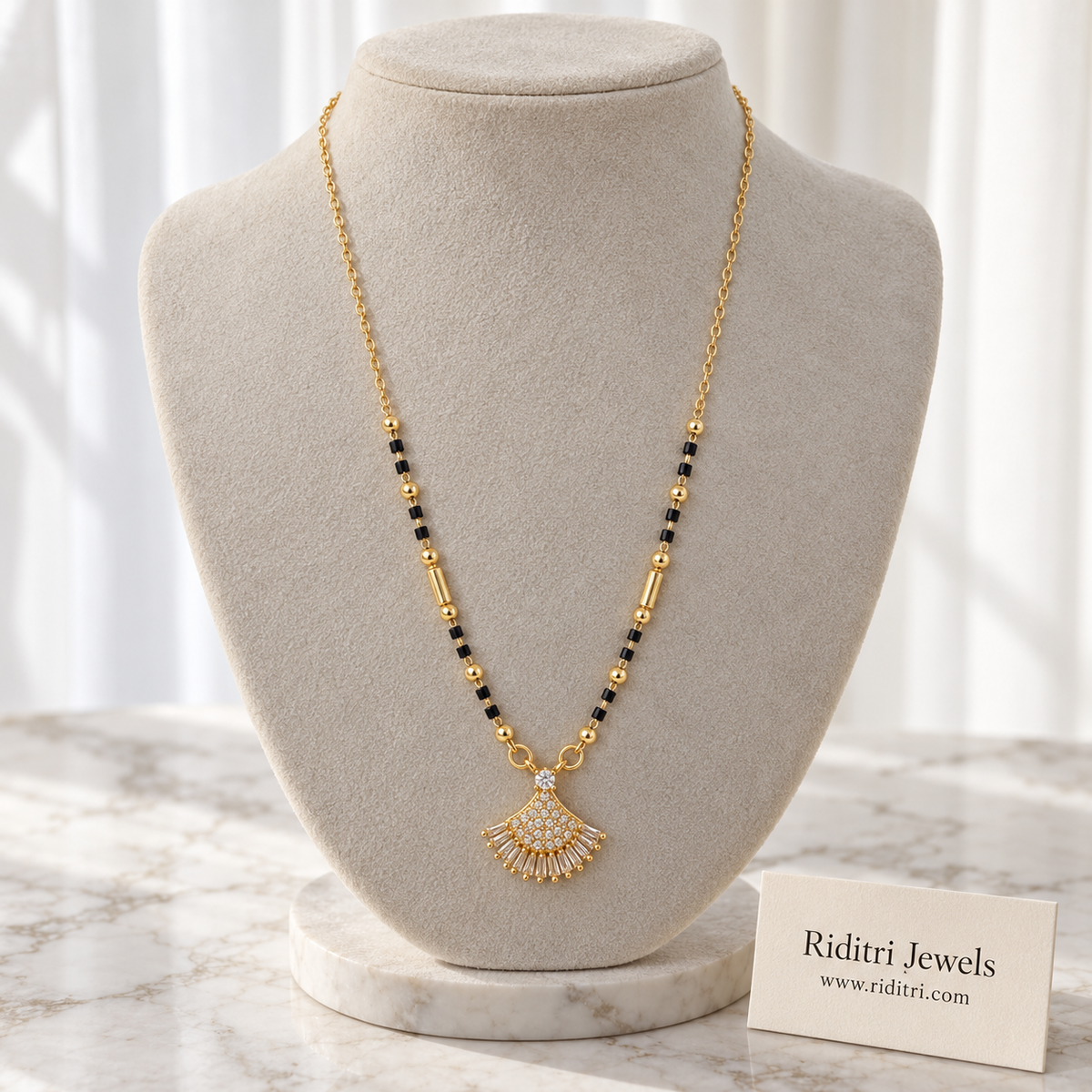 Gold-toned seashell fan mangalsutra pendant with white stones and round stone top