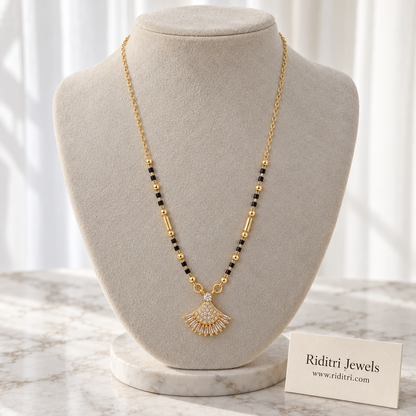 Gold-toned seashell fan mangalsutra pendant with white stones and round stone top
