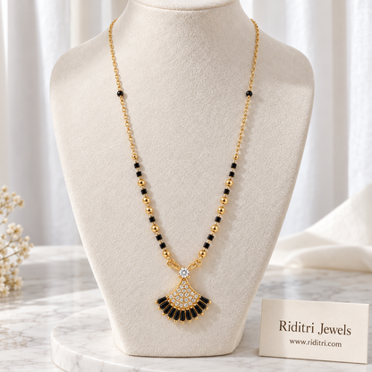 Gold-toned black and white shell fan mangalsutra pendant with black baguette stones