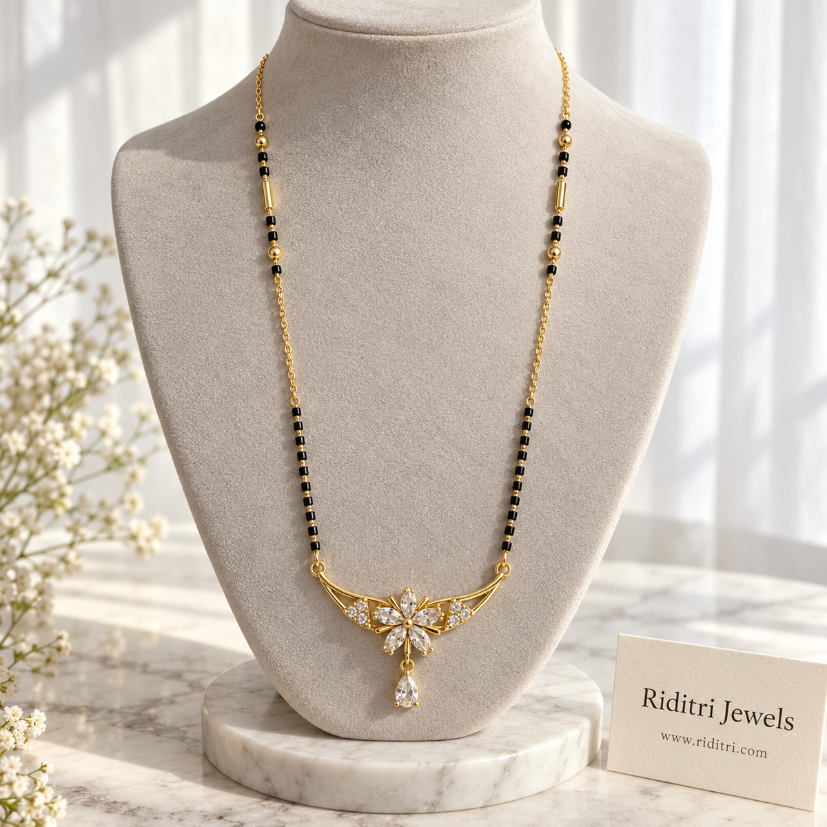 Champa anti-tarnish flower drop mangalsutra with marquise stone flower and pear drop