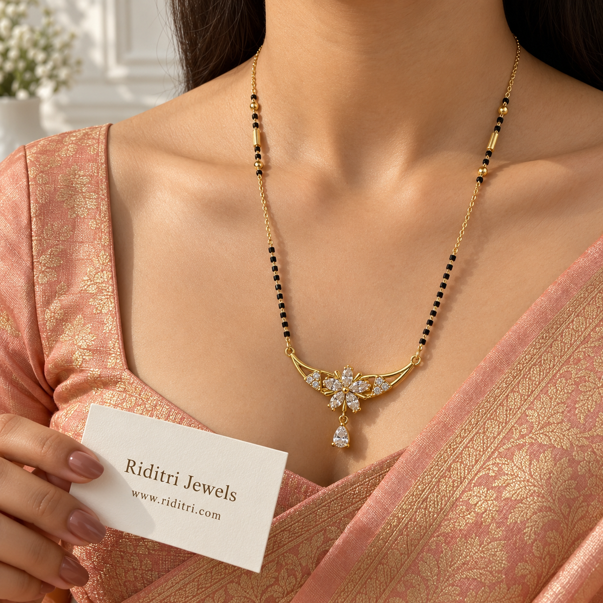 Gold-toned curved bar mangalsutra pendant with five-petal stone flower and triangle clusters
