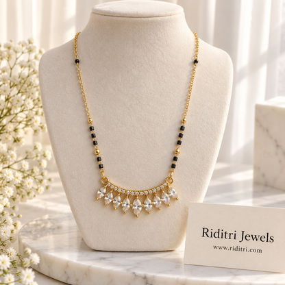 Gold-toned crown-style mangalsutra pendant with row of ten clear marquise stones