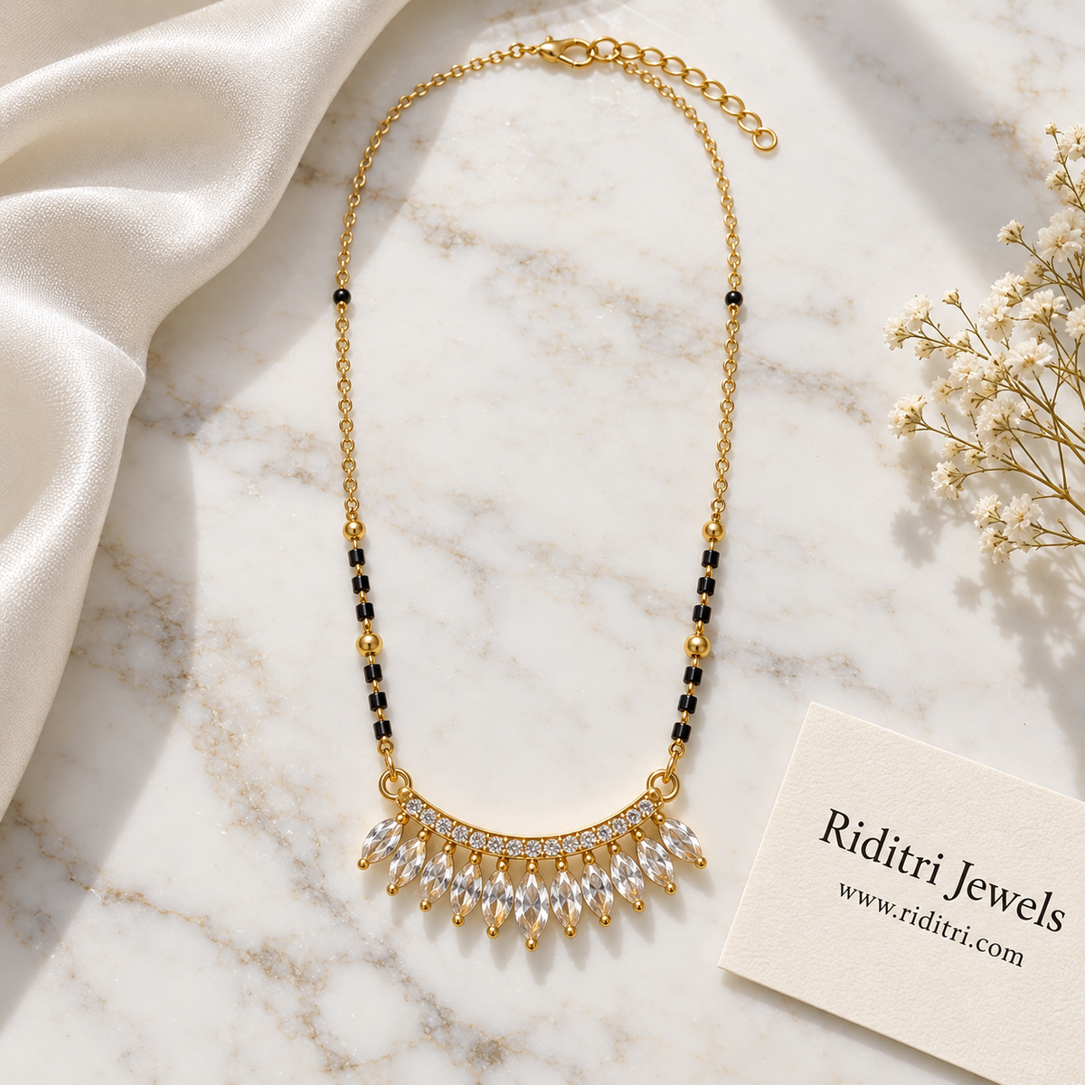 Fine gold chain mangalsutra with black beads, gold beads and marquise crown pendant