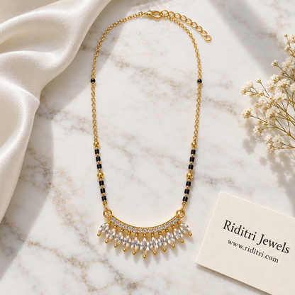Fine gold chain mangalsutra with black beads, gold beads and marquise crown pendant