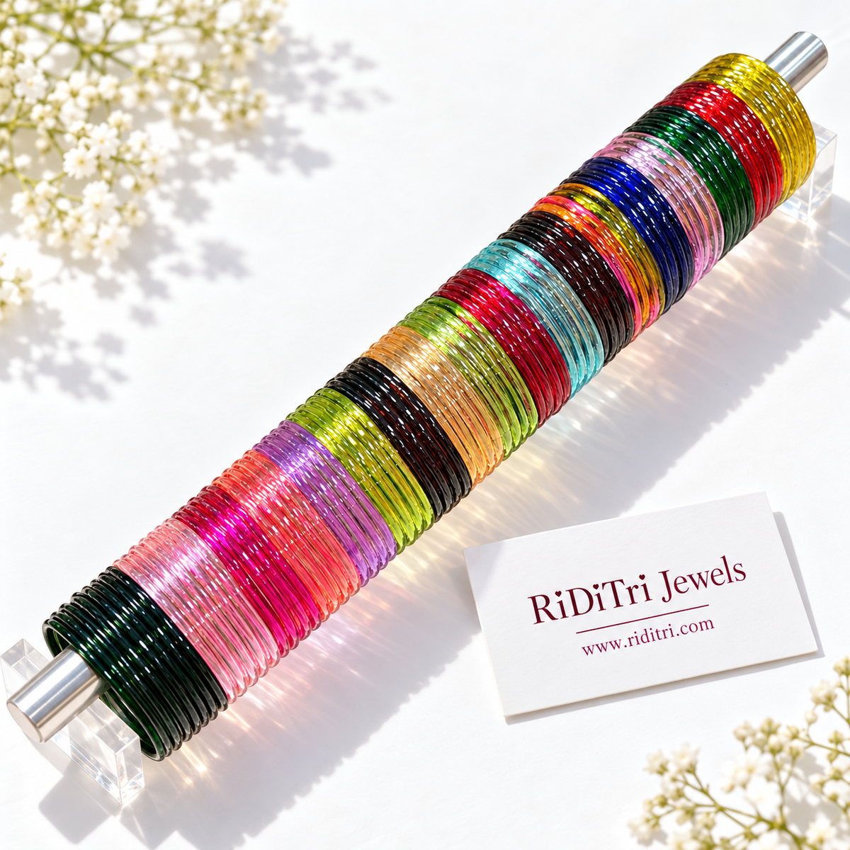 Multicolour 4 mm jelly glass bangles in 18 colours on a white background