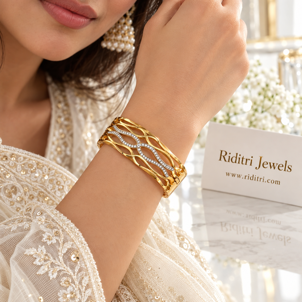 Aura Defined anti-tarnish bracelet worn with pearl earrings and ivory embroidered kurta