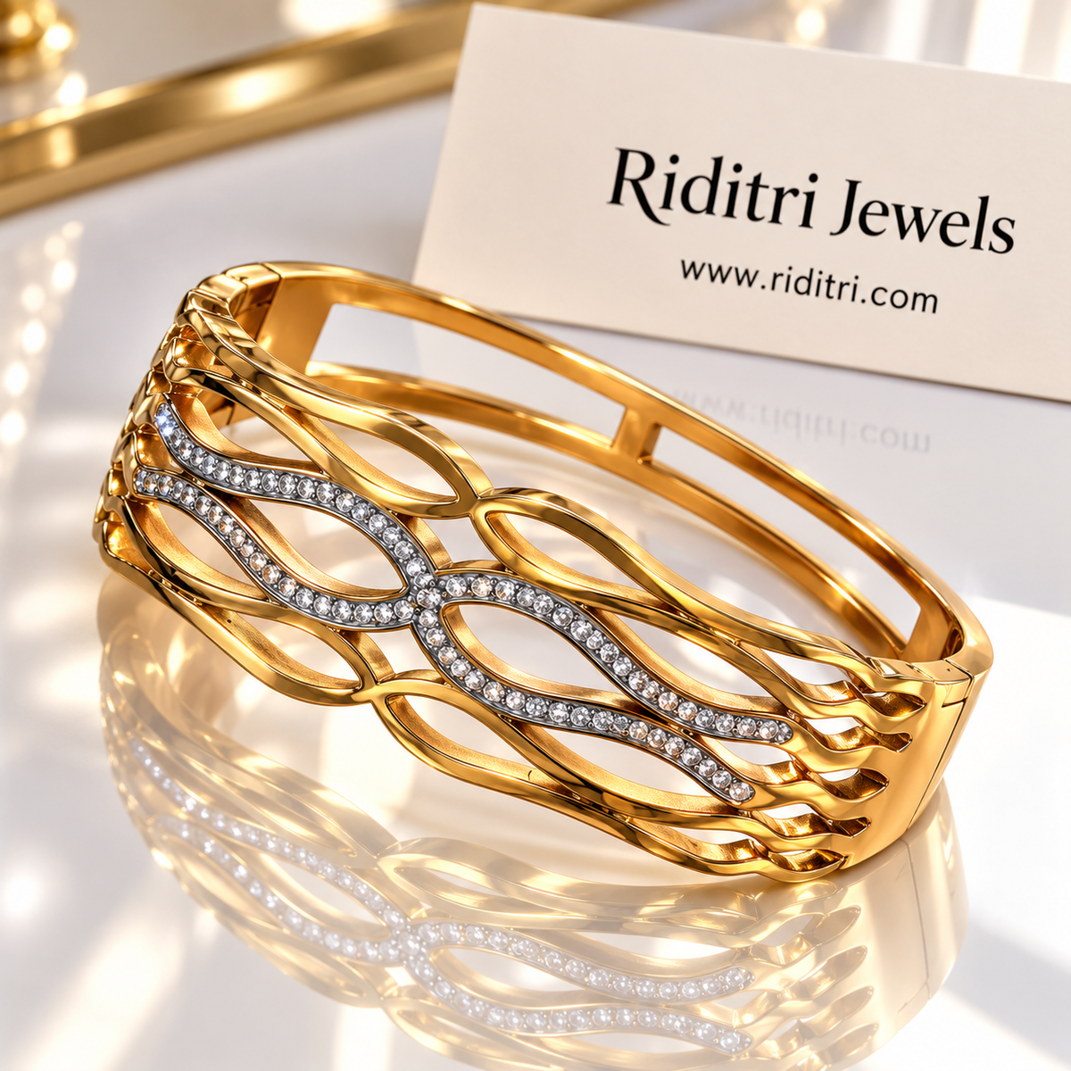 Close-up of Aura Defined bracelet showing layered wave design and CZ stone setting