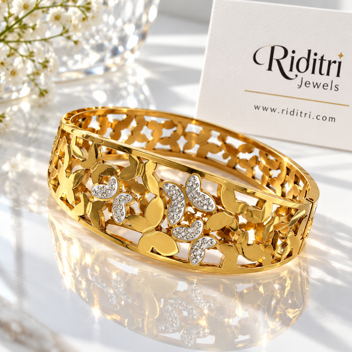 Aura Flutter gold-toned anti-tarnish butterfly bracelet with CZ stones